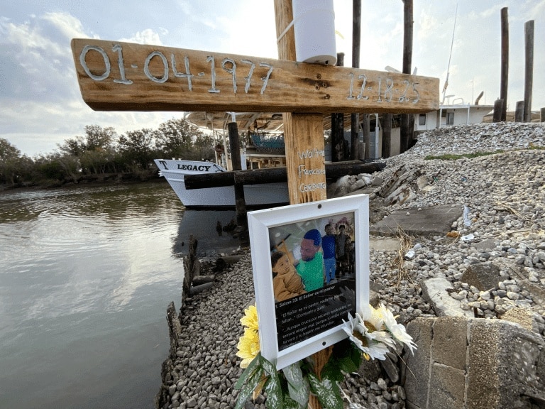 A cross placed alongside Bayou La Loutre marks where Honduran deckhand Walter Cerrato drowned.