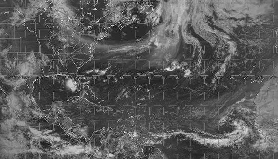 A loop of visible satellite images showing the features of interest across the Atlantic and eastern U. S. today