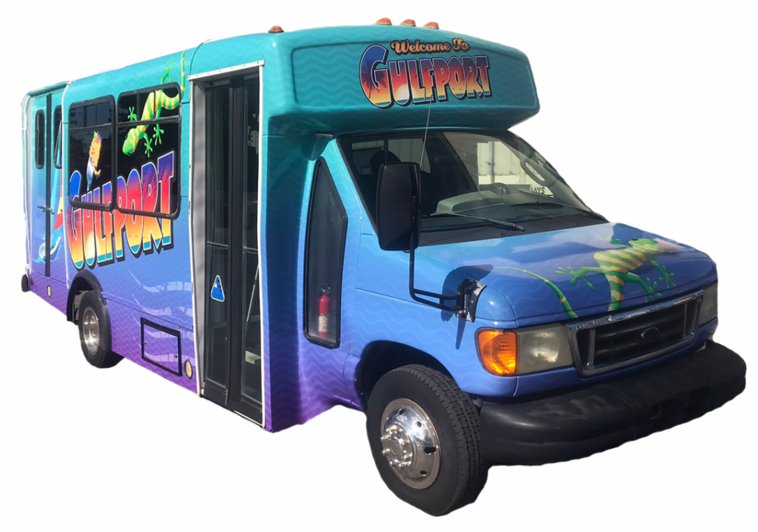 Photo. Colorful shuttle bus with artwork. Text on side and front reads Welcome to Gulfport. Design includes iguana and parrot illustrations. Blue purple and green gradient background.