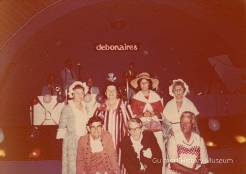 A color photograph of the Bicentennial Costume Ball winners.